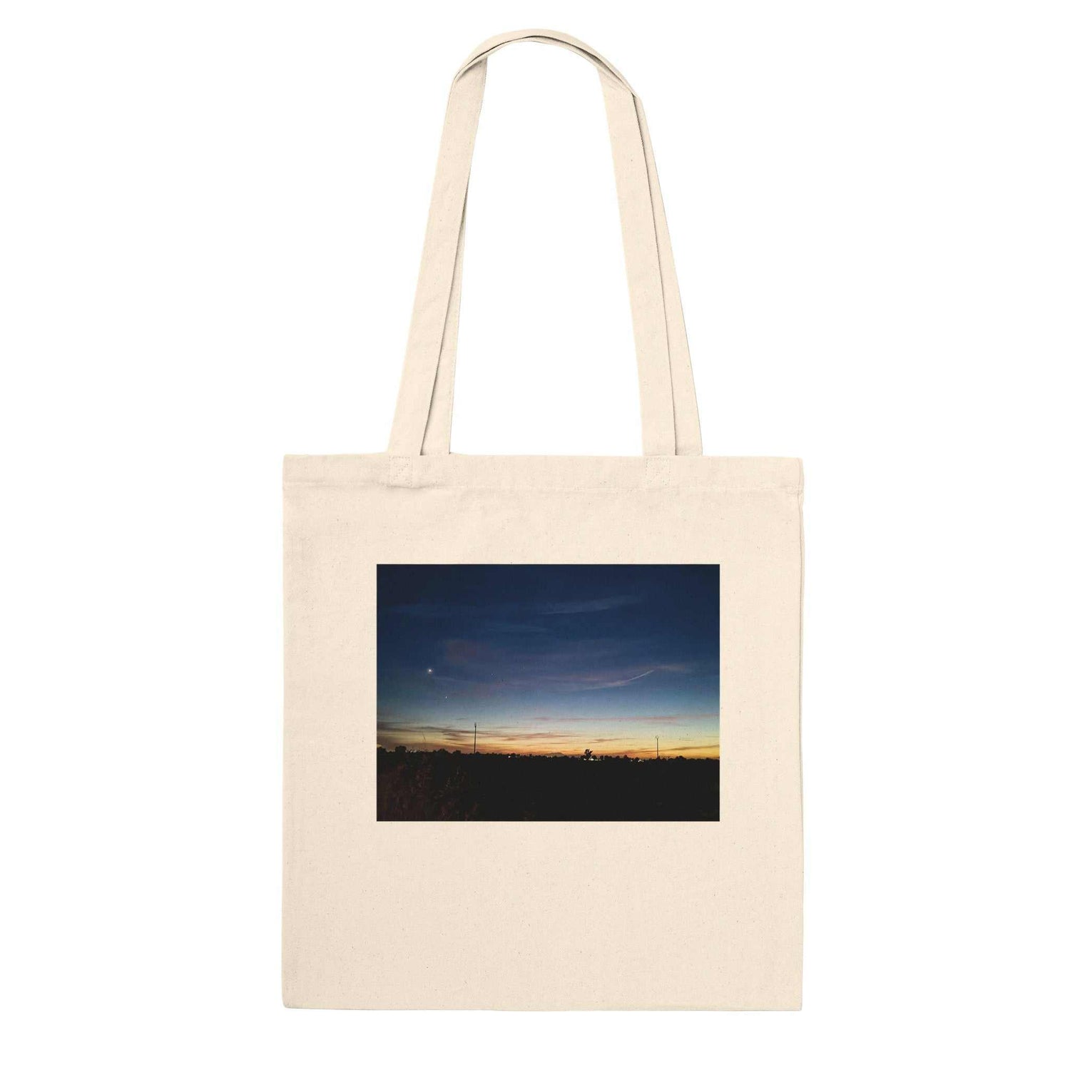 Sunset Premium Cotton Tote Bag – Eco-Friendly Reinforced Carry-AllElevate your daily carry with our premium Sunset Tote Bag, a perfect blend of style, durability, and sustainability. Featuring a vibrant sunset design, this high-quaPrint MaterialKawaii Therapy ShopKawaii Therapy ShopSunset Premium Cotton Tote Bag