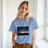 Sunset graphic T-shirt by Kawaii Therapy Shop featuring soft cotton fabric and crew neck, with vibrant sunset print design.
